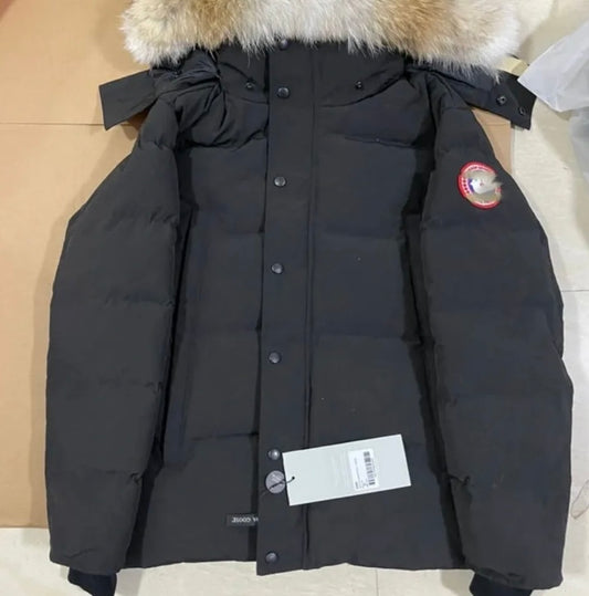 Black parka red badge